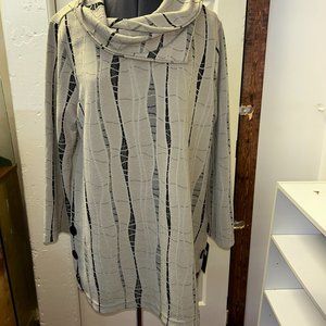 scoop-neck long tunic sweater.